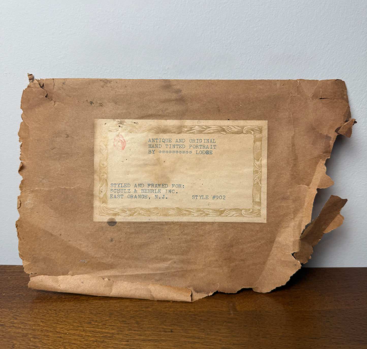 Antique hand-tinted portrait by Lodge