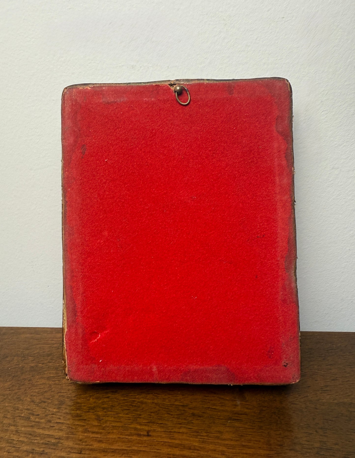 Antique miniature portrait of lady with red velvet matting