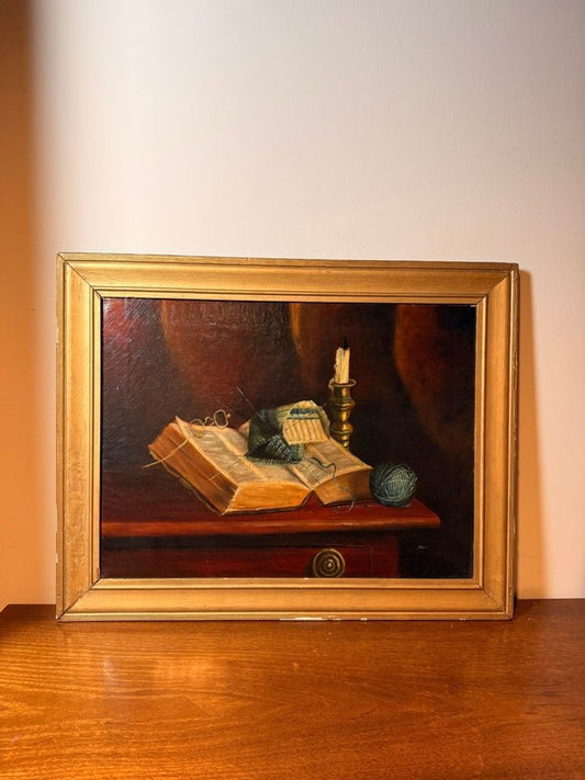 Antique still life with book and yarn