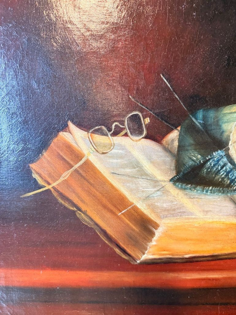 Antique still life with book and yarn