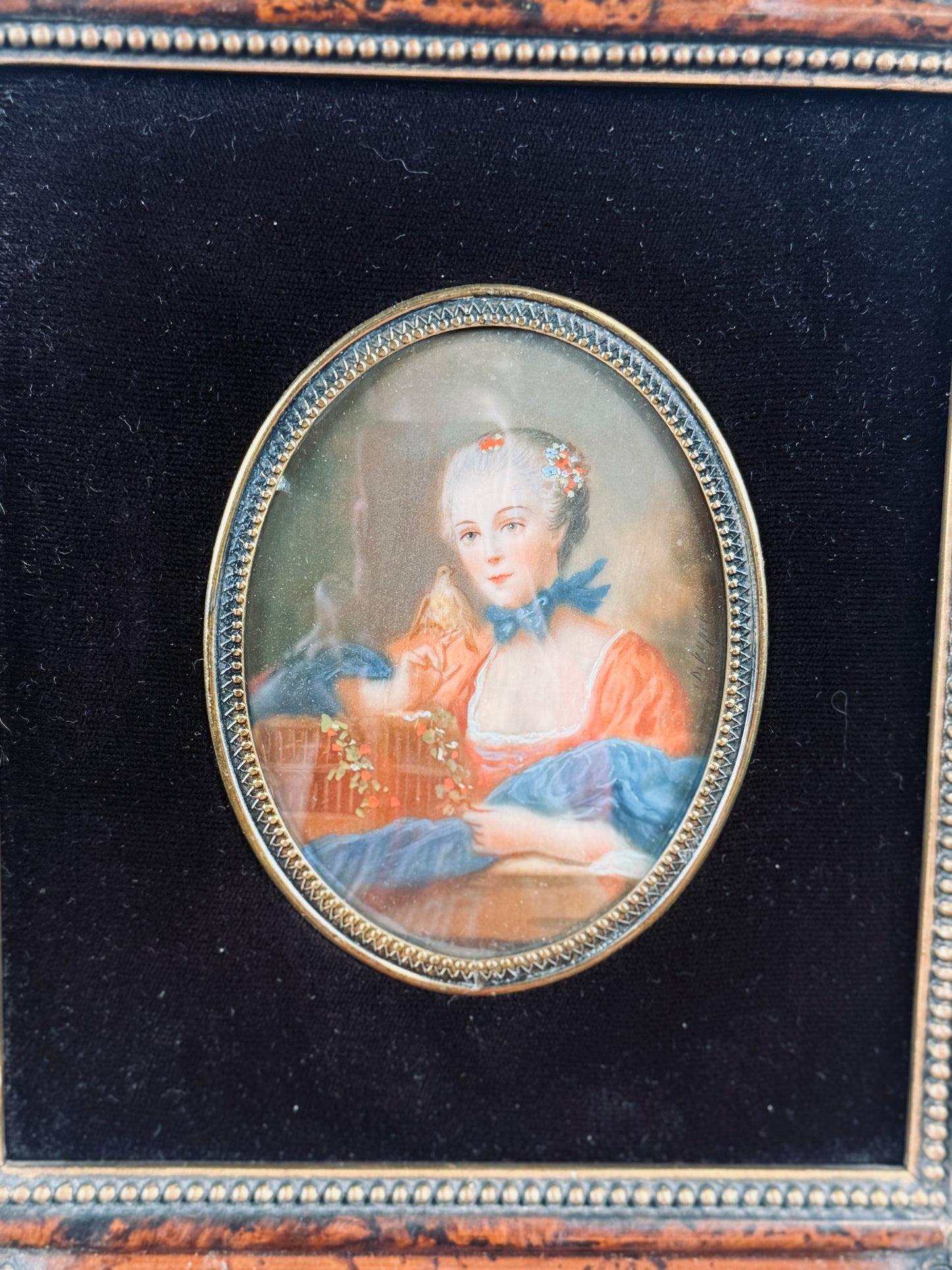 Antique miniature portrait — lady with a birdcage