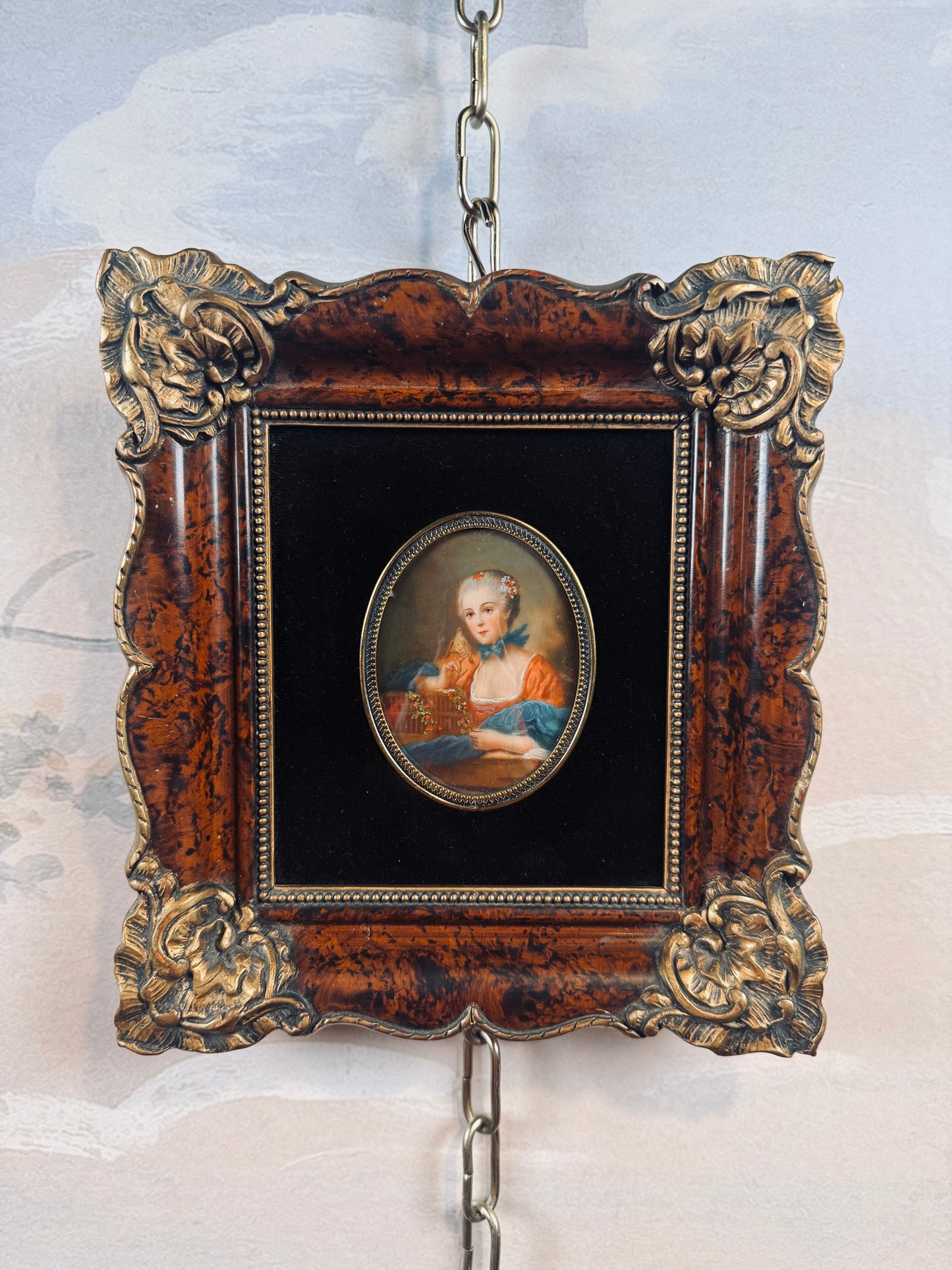 Antique miniature portrait — lady with a birdcage