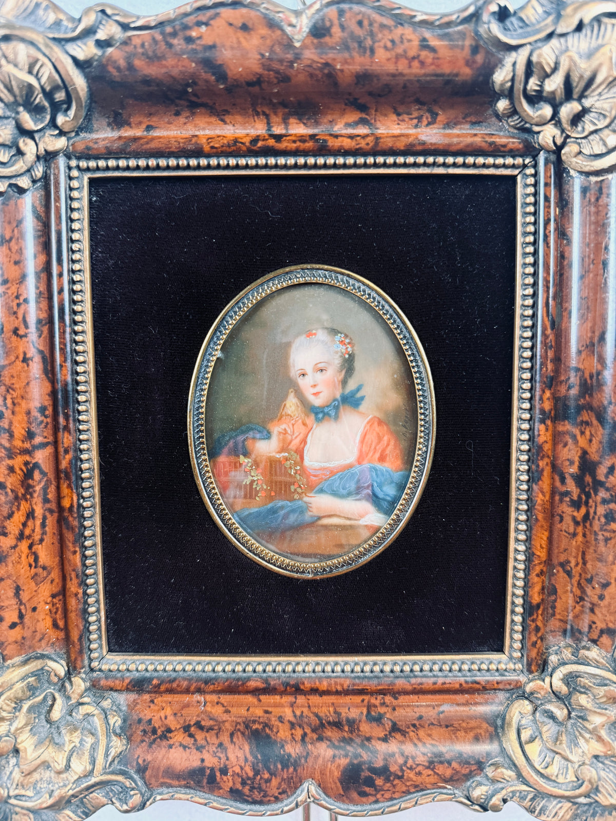 Antique miniature portrait — lady with a birdcage