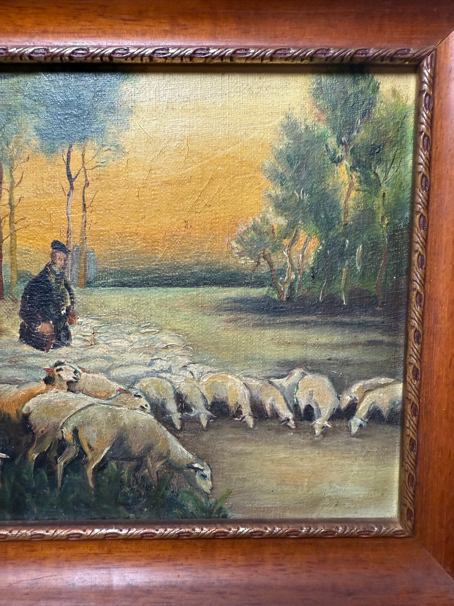 Shepherd with flock in pastoral landscape